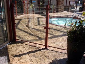 Large Ashler with Stone Skin Border Stamped Concrete Pool