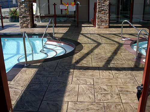 Large Ashler with Stone Skin Border Stamped Concrete Pool