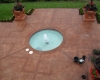 Large Ashler with Stone Skin Border Stamped Concrete Pool