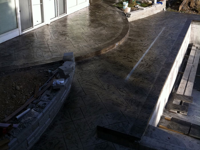 Large Ashler with Stone Skin Border Stamped Concrete Pool