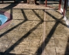 Large Ashler with Stone Skin Border Stamped Concrete Pool